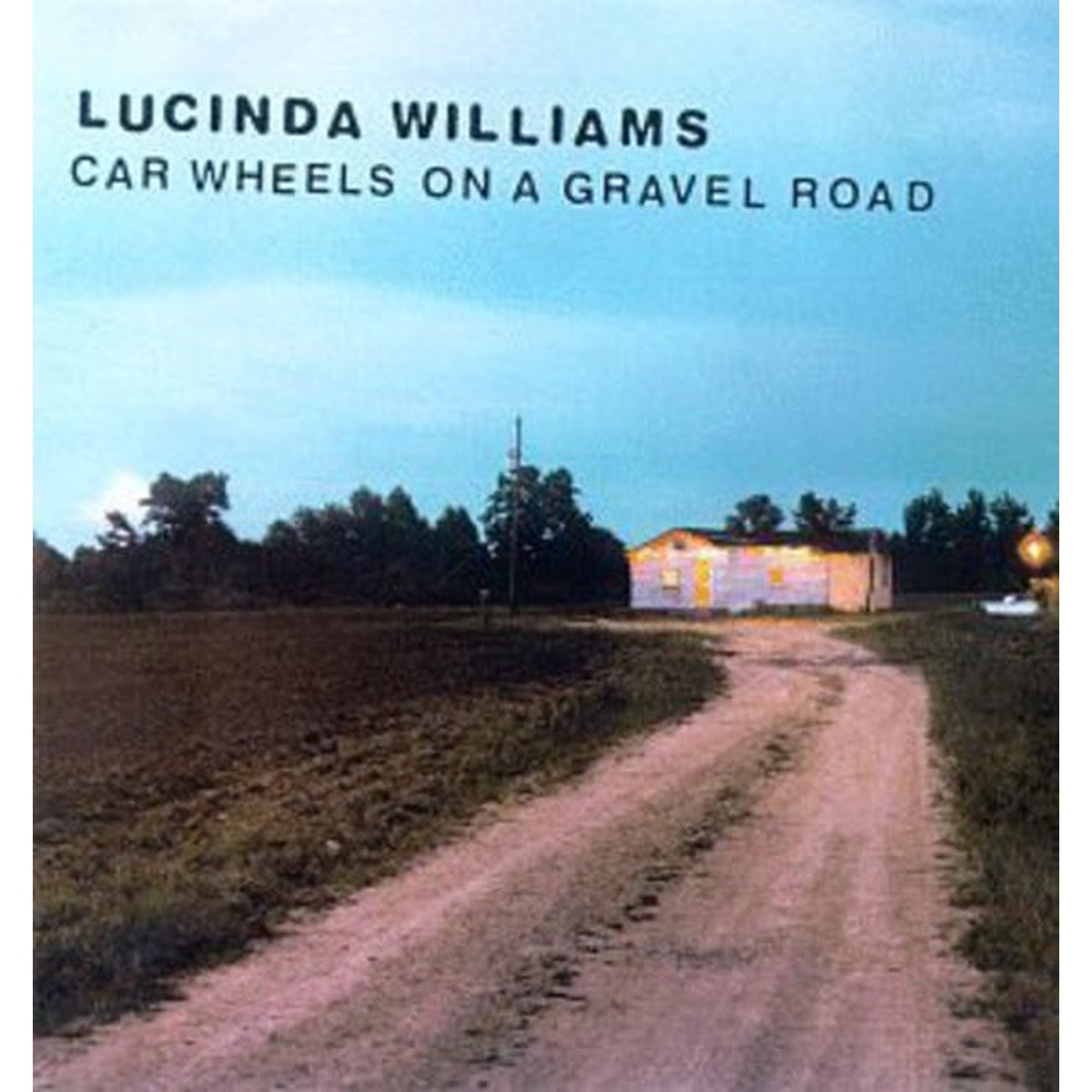 Car Wheels On A Gravel Road