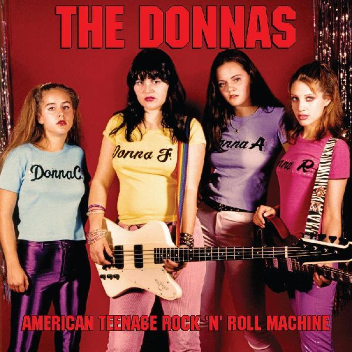 Donnas (Natural With Black Swirl LP Vinyl) & American Teenage Rock 'N' Roll Machine (Fire Orange With Black Swirl LP Vinyl) & Spend The Night (Clear With Canary & Pink Splatter LP Vinyl)