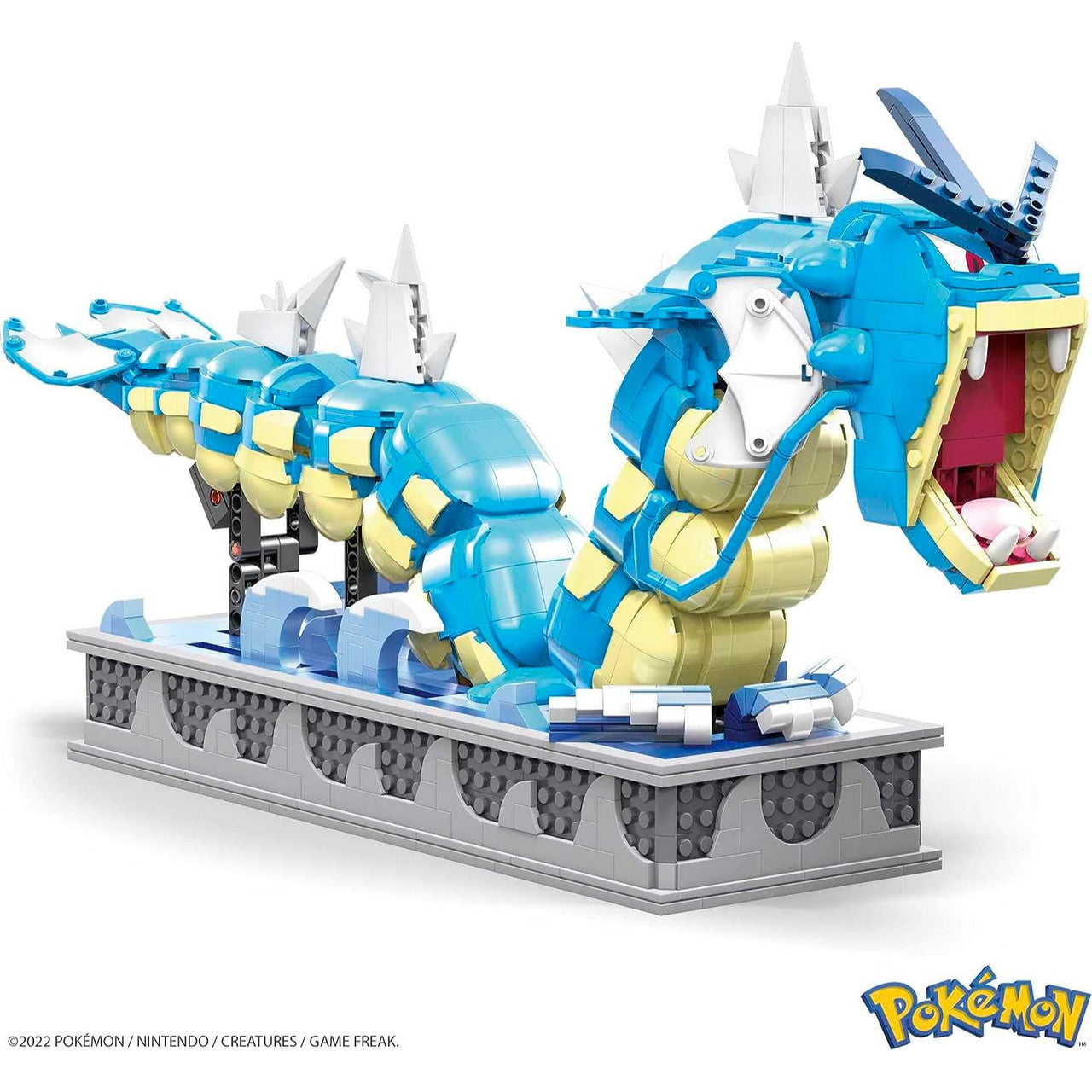 This is brand new.Build a detailed and elaborate Gyarados with this fully mechanized building set, which is mounted on a display and features animated movements like an opening mouth, flapping tail and pivoting neck when the toy is activated by a hand-turned crank.