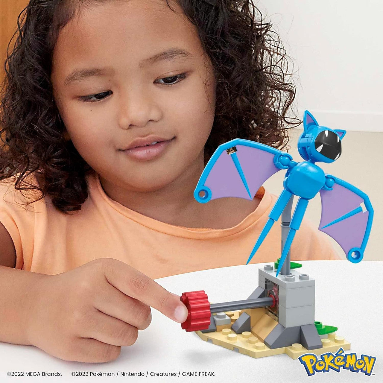 This is brand new.Watch Zubat take flight with this building set featuring the innovative Motion Brick! Build the desert environment, then turn the crank to see Zubat fly in circles over the desert. Combine with other Adventure Builder sets to create an expanded Pokémon world with motion. Each sold separately.